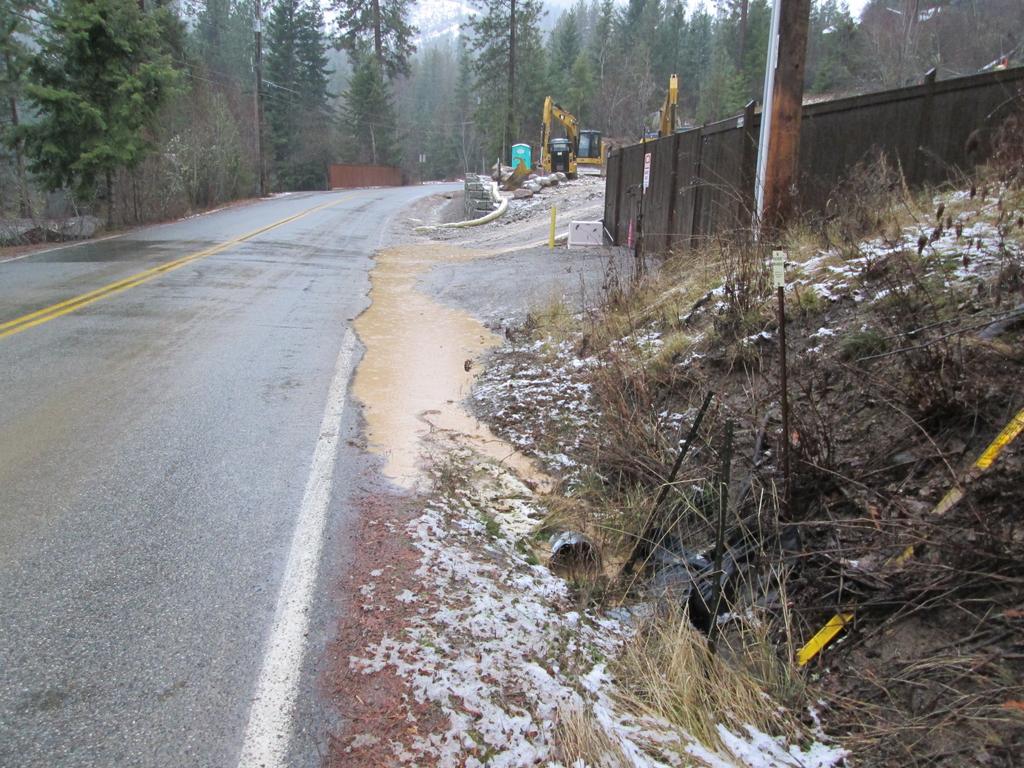 Runoff, from poorly protected construction site, carries sediment down lower Hayden Lake Drive